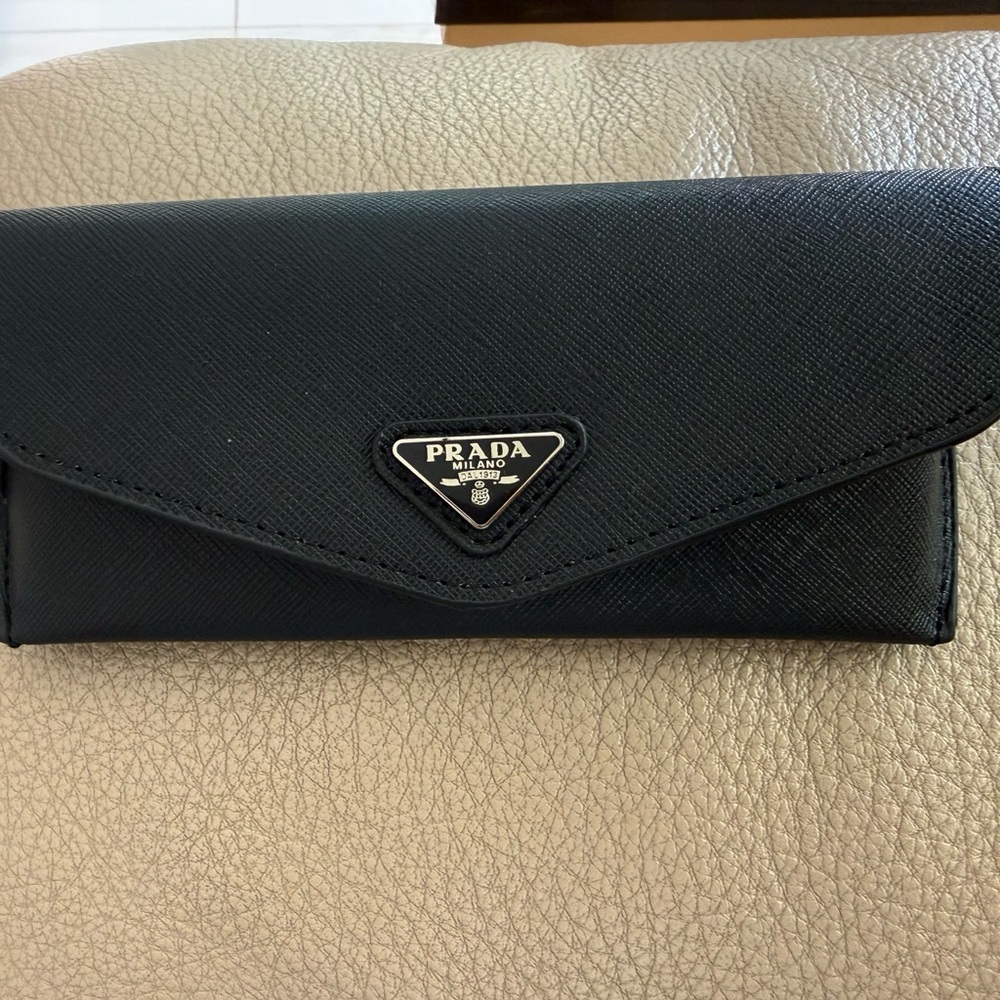 Prada Black Women's Cat-Eye Sunglasses with Silver Logo Accent - Picture 6 of 9